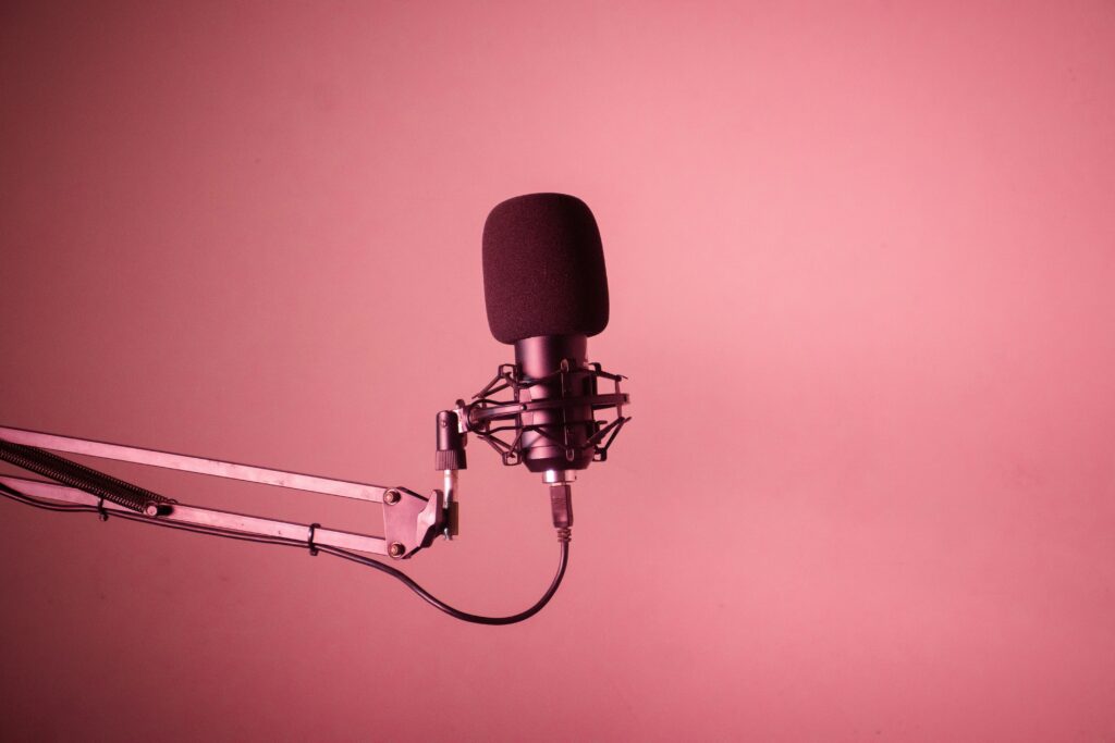 Studio microphone on a pink background